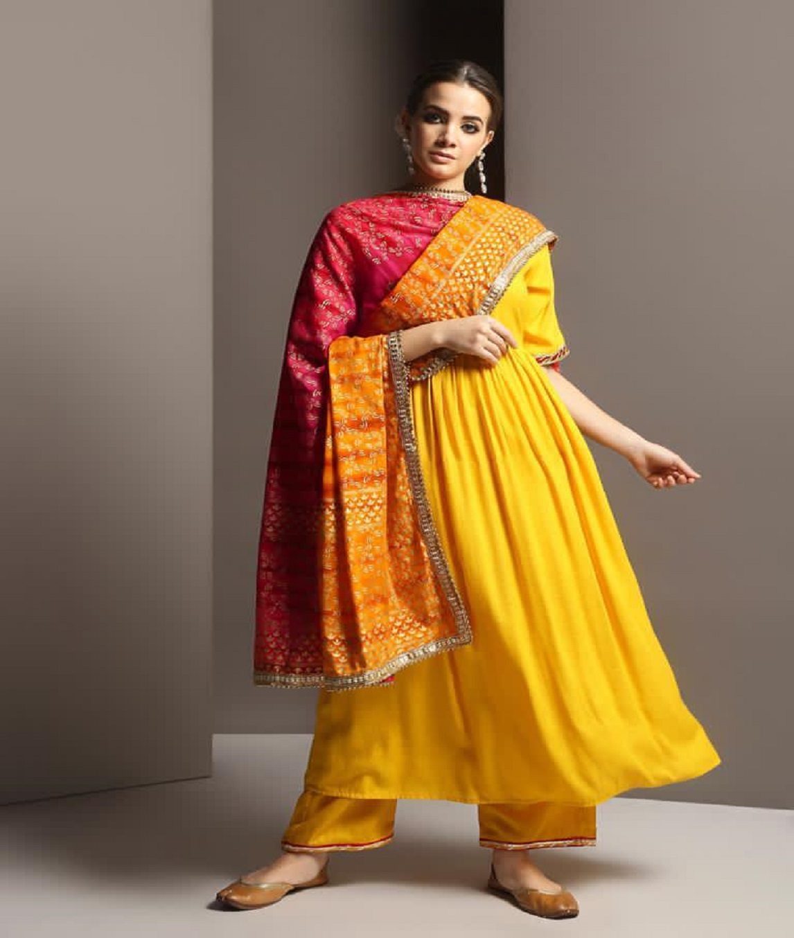 A pretty yellow Anarkali dress with gotta and  Tie Dye Dupatta c